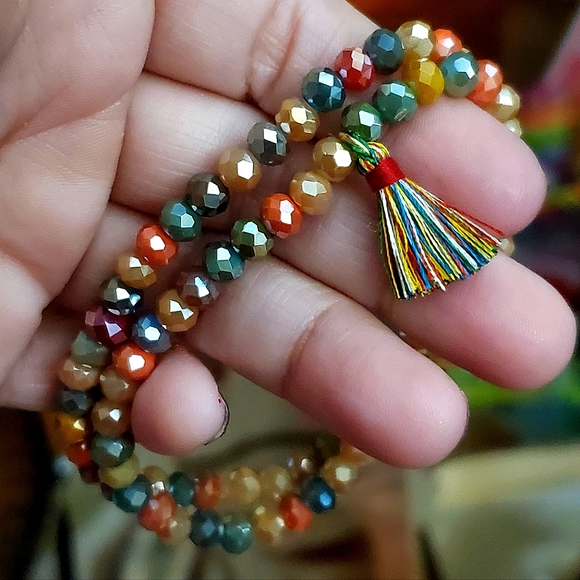 Crystal rondelle beaded double stretch bracelet with tassel charm. 6mm beads. - Picture 3 of 4